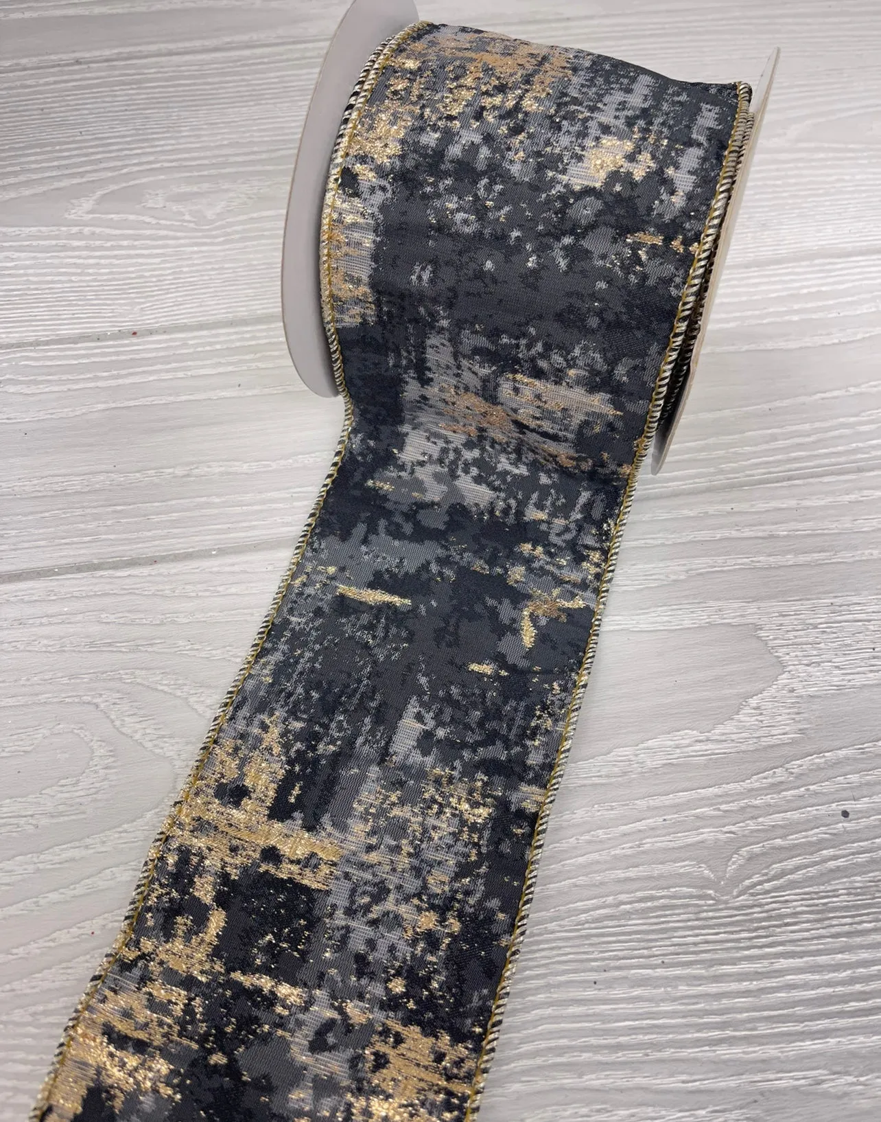 Black, gray, and champagne wired ribbon 4”