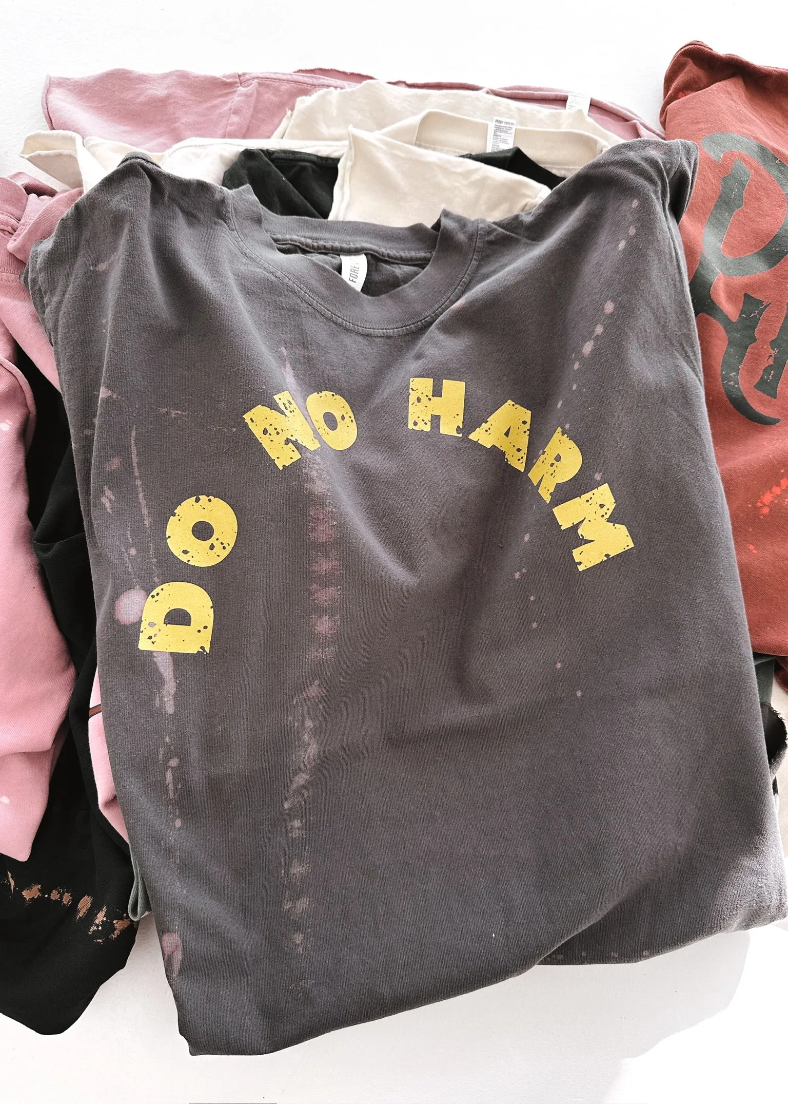 DO NO HARM BLEACHED OUT SIDE SLIT TEE
