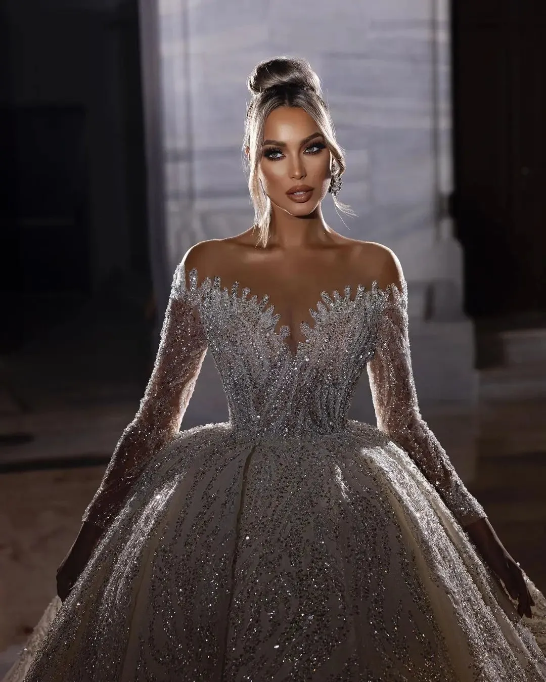 Luxury Strapless Princess Wedding Gown with Beaded Illusion Sleeves and Deep V-Neck